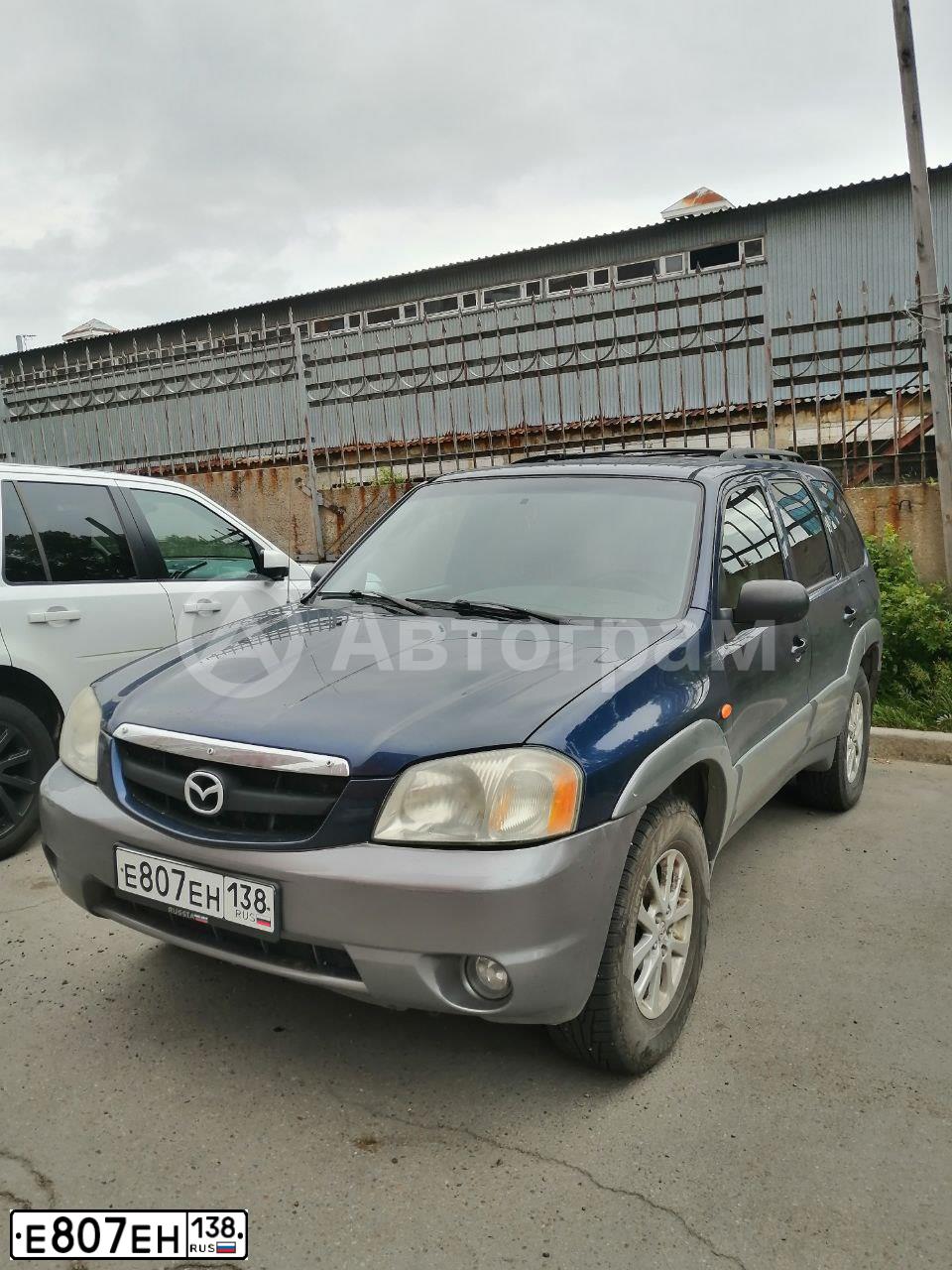Фото автомобиля MAZDA TRIBUTE, 2002 — госномер Е807ЕН138. Цвет: синий