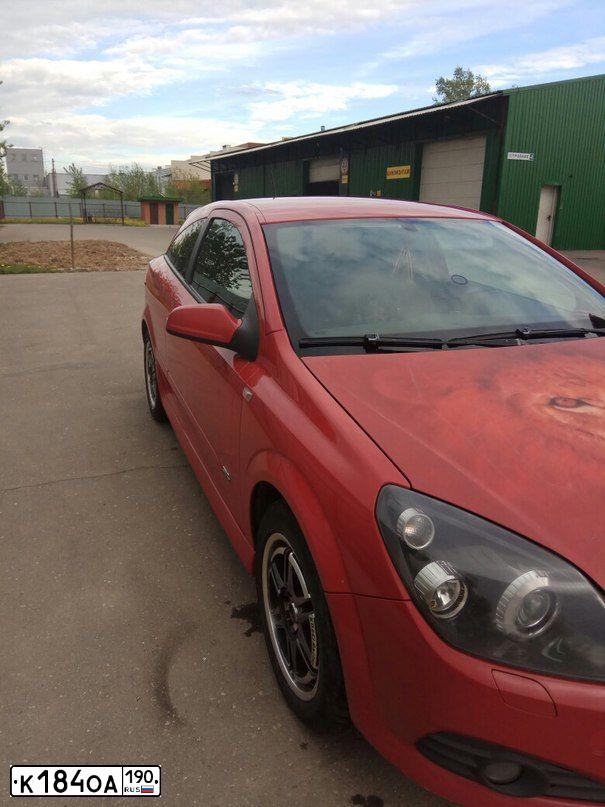 Фото автомобиля OPEL ASTRA, 2007 — госномер Р361РМ797. Цвет: Красный