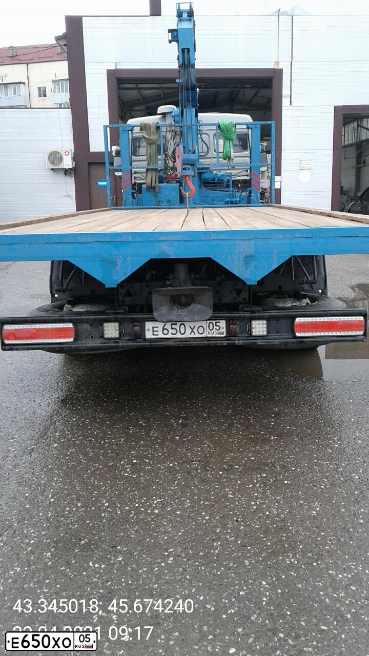Фото автомобиля KAMAZ 54115 /6X4/, 2004 — госномер Е650ХО05. Цвет: СВ.ДЫМКА