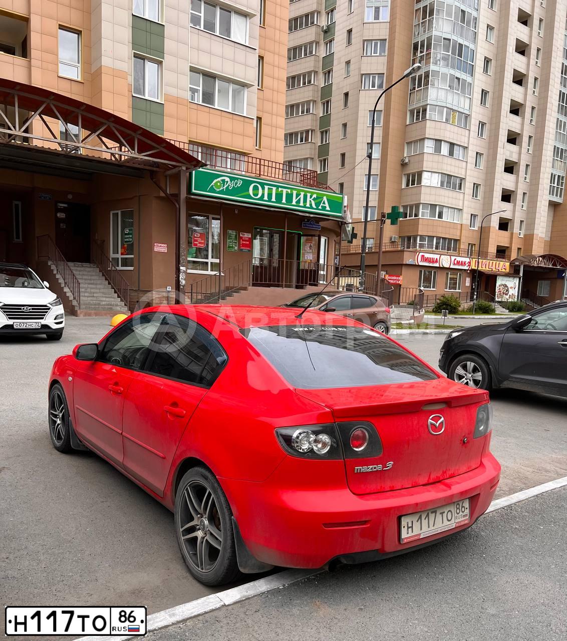 Фото автомобиля MAZDA 3, 2008 — госномер Н117ТО86. Цвет: Красный