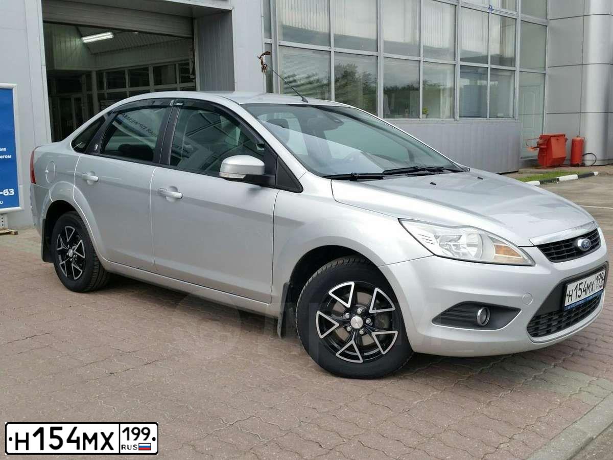 Фото автомобиля FORD FOCUS, 2008 — госномер Н154МХ199. Цвет: СЕРЫЙ