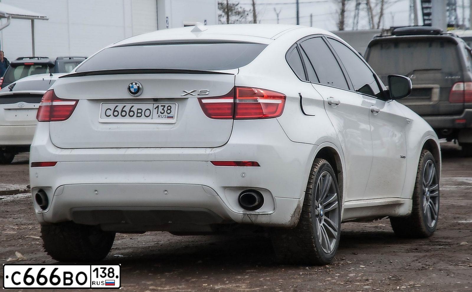 Фото автомобиля BMW X6, 2013 — госномер С666ВО138. Цвет: Белый