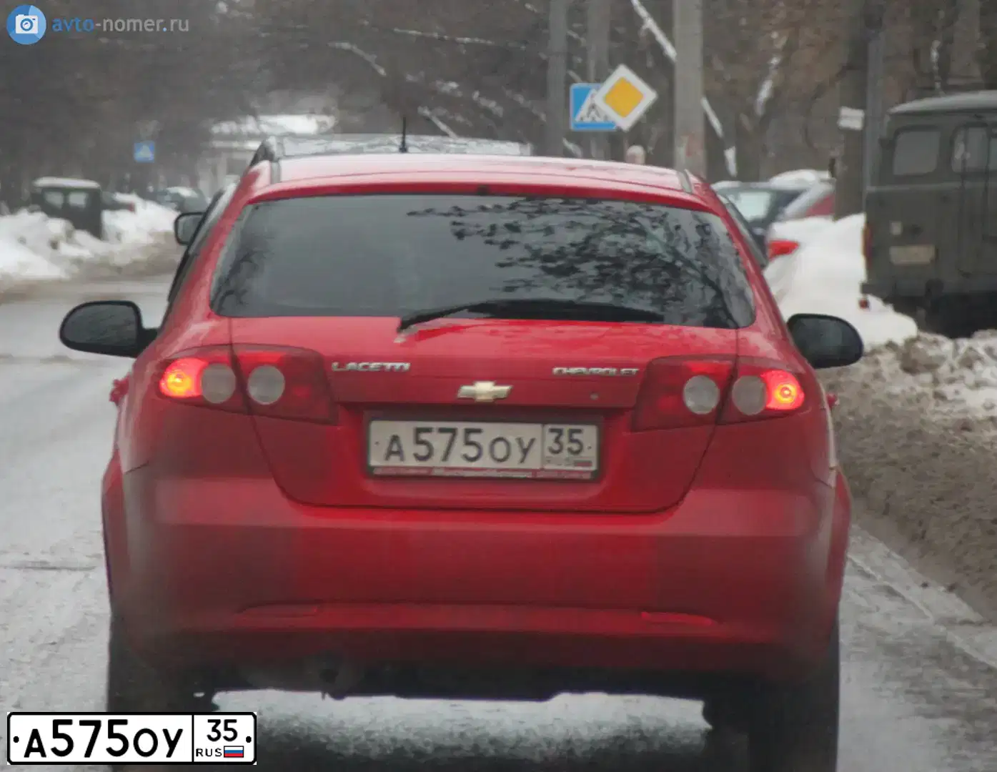 Фото автомобиля CHEVROLET LACETTI, 2008 — госномер М314ОР76. Цвет: Красный