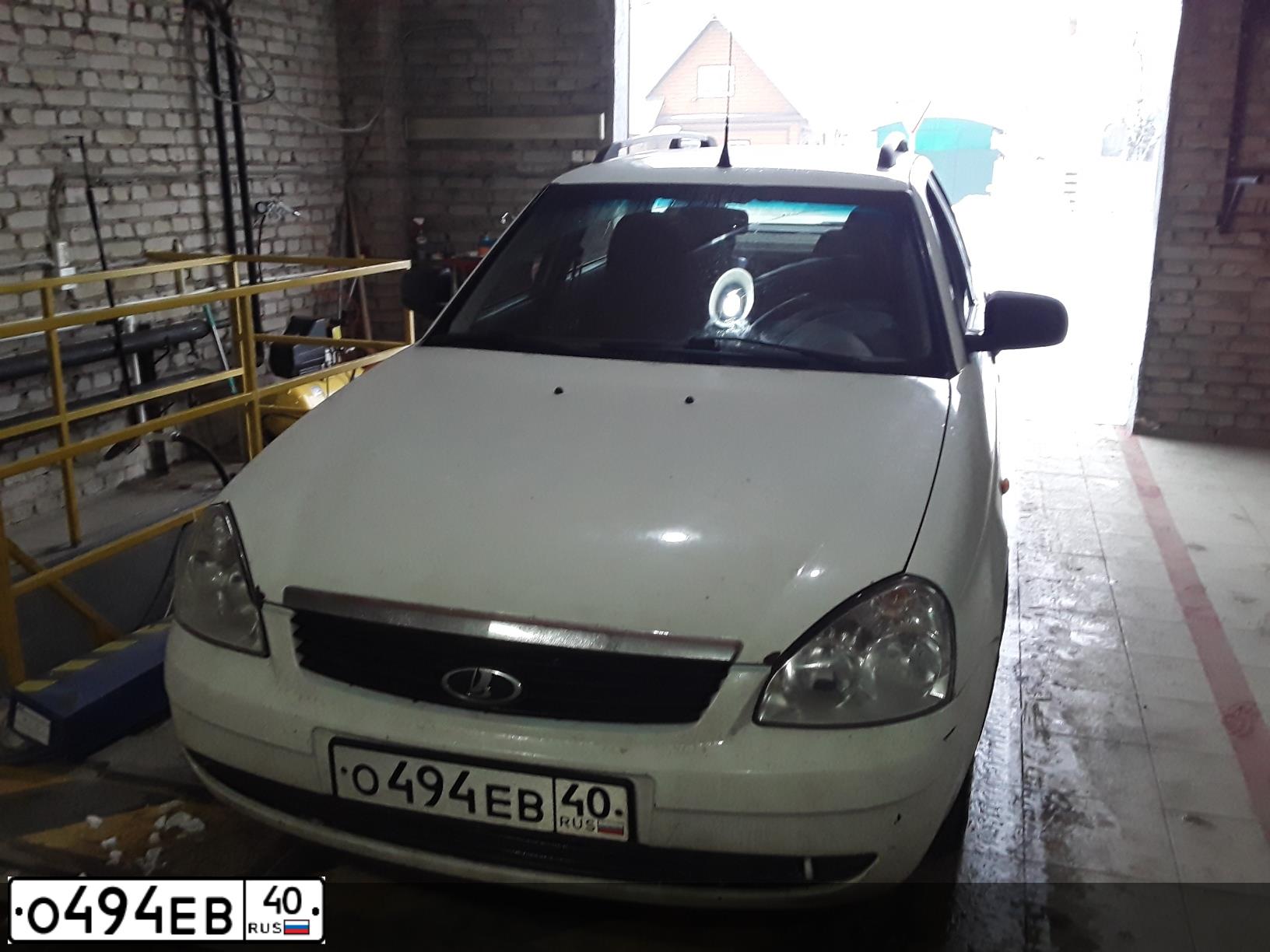 Фото автомобиля LADA 2171 PRIORA, 2011 — госномер О494ЕВ40. Цвет: БЕЛЫЙ