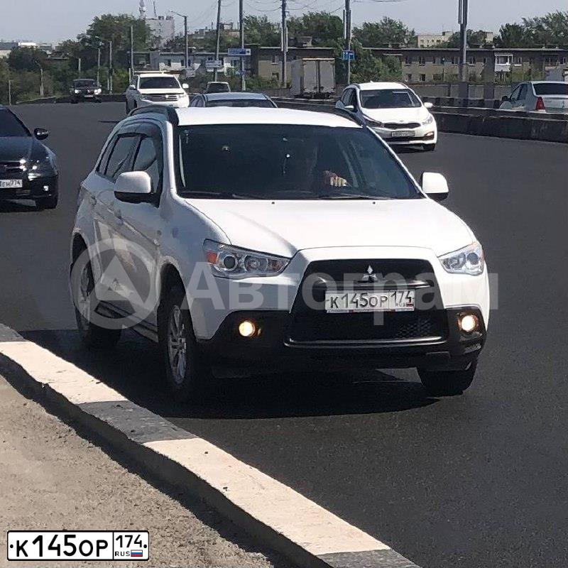 Фото автомобиля MITSUBISHI ASX, 2011 — госномер К145ОР174. Цвет: БЕЛЫЙ