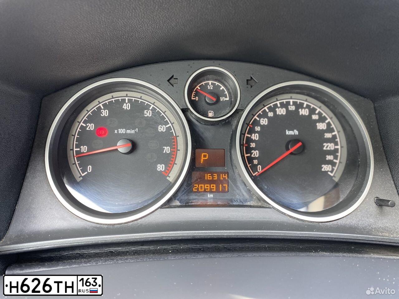 Фото автомобиля OPEL ASTRA, 2009 — госномер В890УР790. Цвет: СЕРЕБРИСТЫЙ