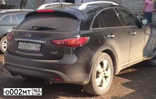 Фото автомобиля INFINITI QX70 /FX/, 2011 — госномер Х765ВЕ163. Цвет: ЧЕРНЫЙ