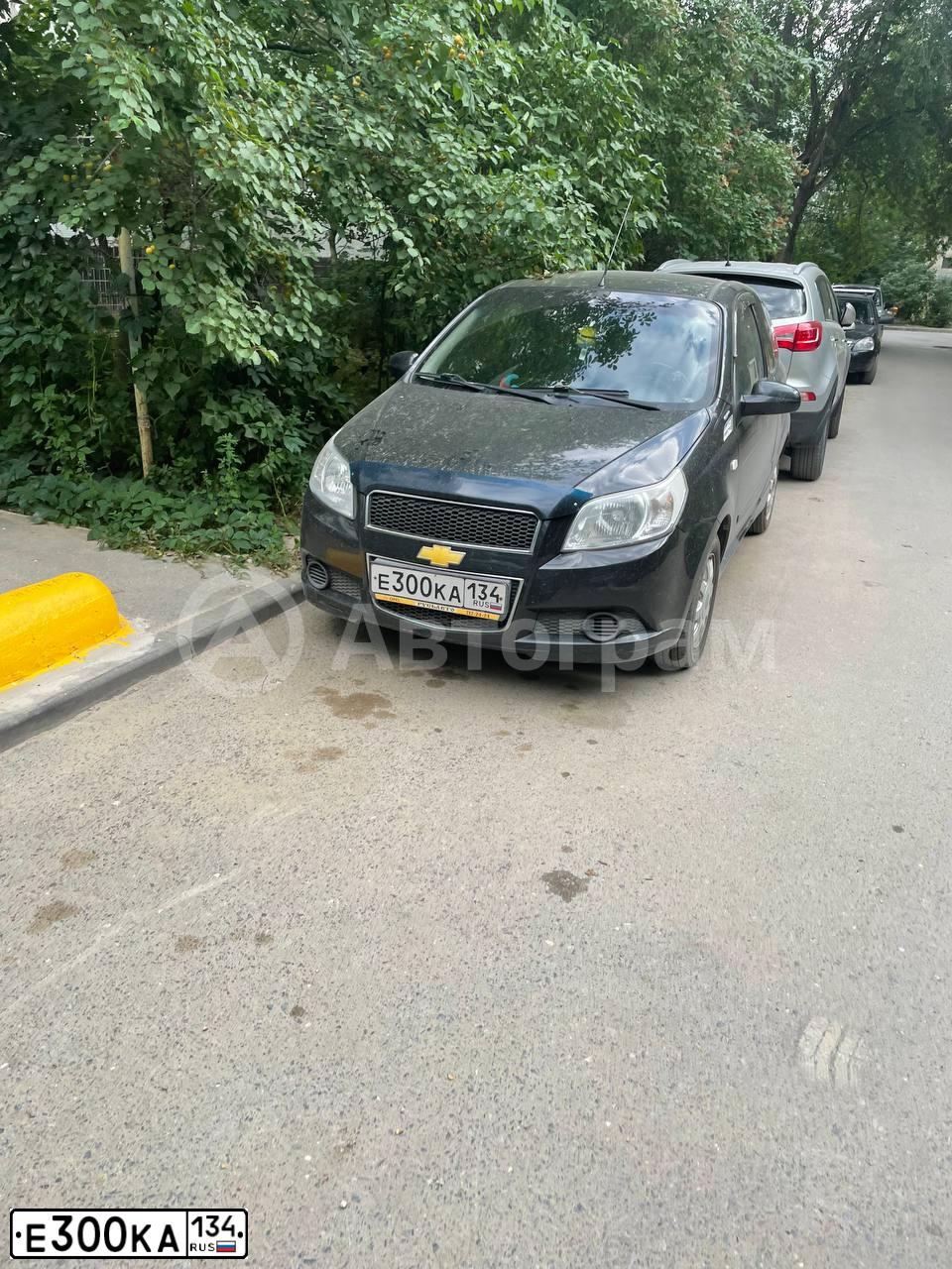 Фото автомобиля CHEVROLET AVEO, 2009 — госномер В111АУ134. Цвет: ЧЕРНЫЙ
