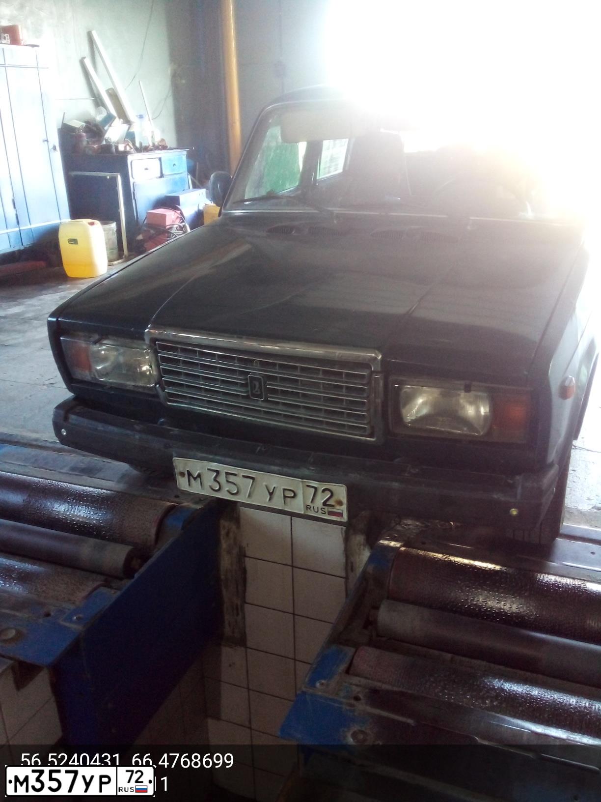 Фото автомобиля LADA 2107, 2009 — госномер М357УР72. Цвет: Темно-зеленый