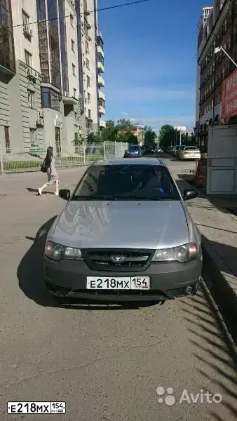 Фото автомобиля DAEWOO NEXIA, 2011 — госномер О158НР142. Цвет: СЕРЫЙ