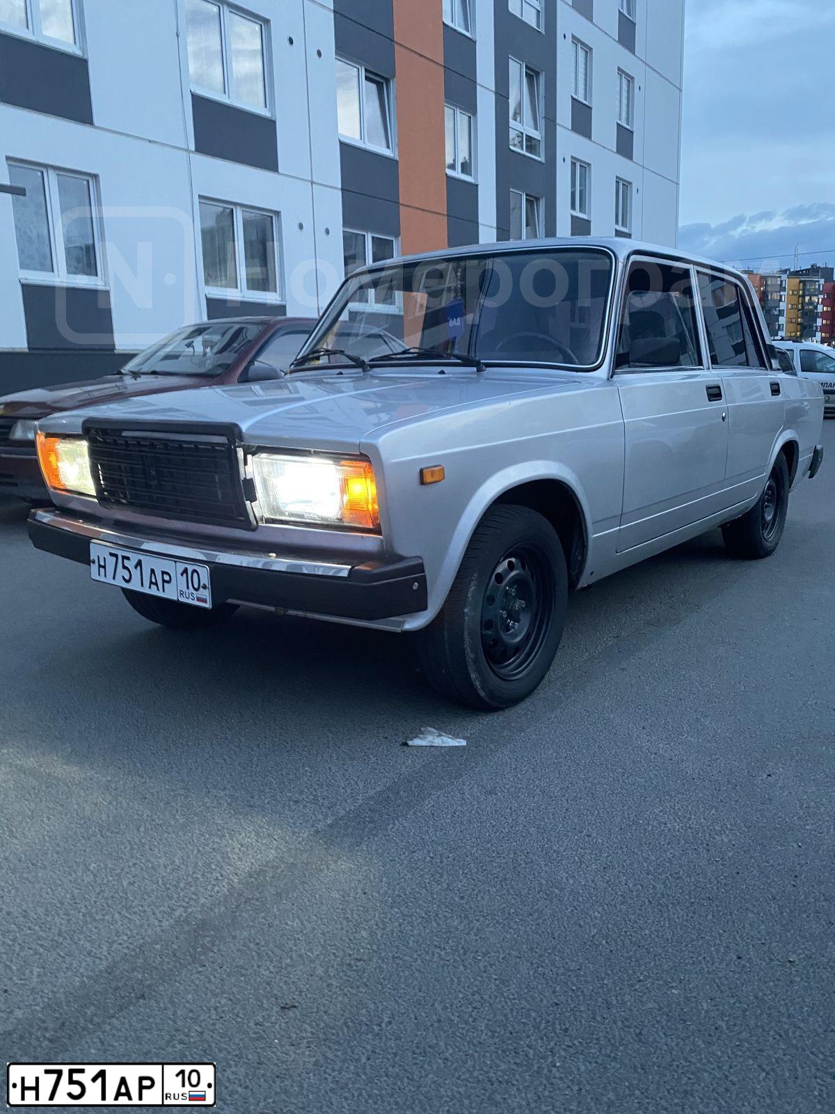 Фото автомобиля LADA 2107, 2011 — госномер Н419МХ10. Цвет: СЕРЕБРИСТЫЙ