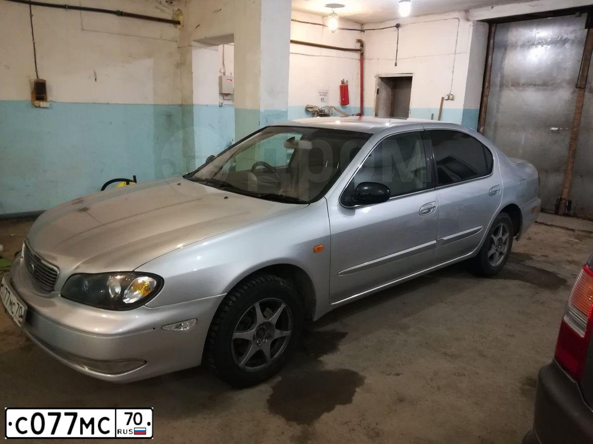 Фото автомобиля LADA 1117 KALINA, 2008 — госномер С077МС70. Цвет: ТЕМНЫЙ СИНЕ-ФИОЛЕТОВЫЙ