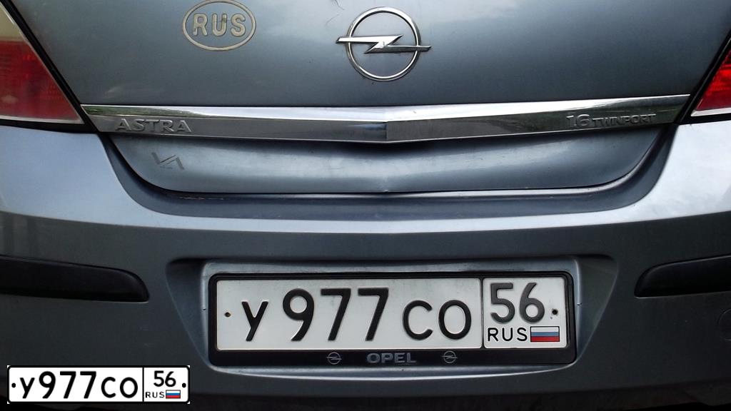Фото автомобиля OPEL ASTRA, 2006 — госномер У977СО56. Цвет: Серый