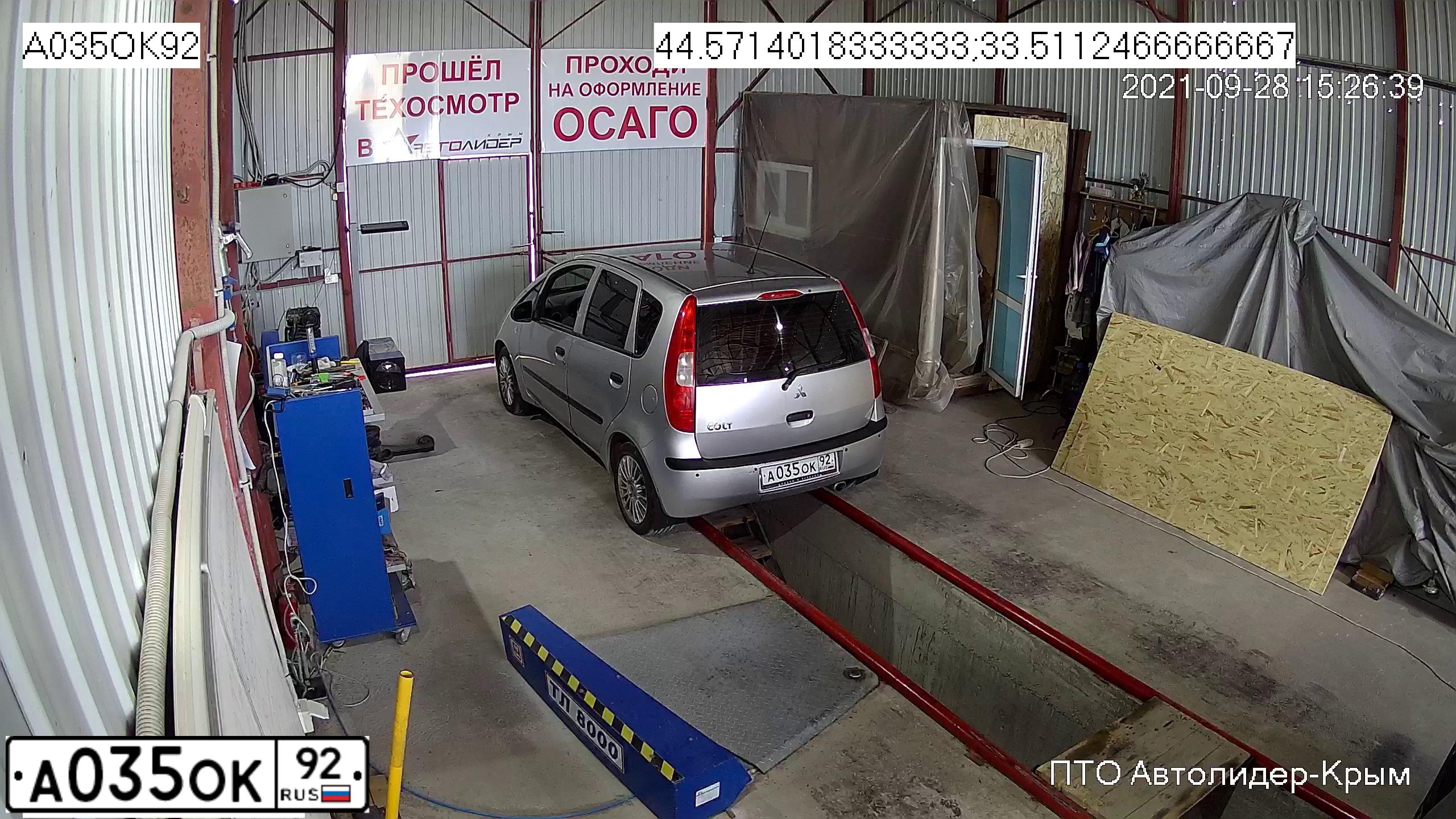 Фото автомобиля MITSUBISHI МИЦУБИСИ COLT 1.3, 2005 — госномер А035ОК92. Цвет: Серый