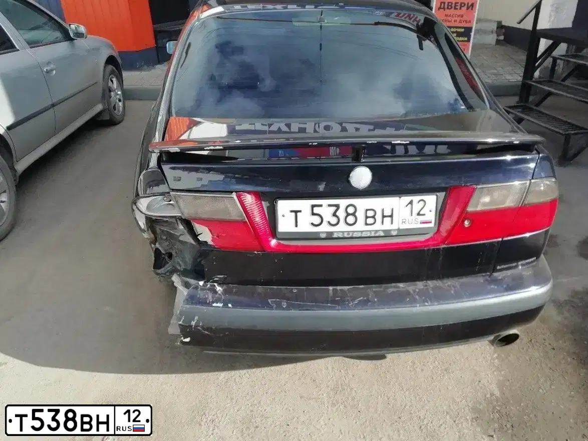 Фото автомобиля SAAB 9-5, 1998 — госномер Р057РР64. Цвет: СИНИЙ