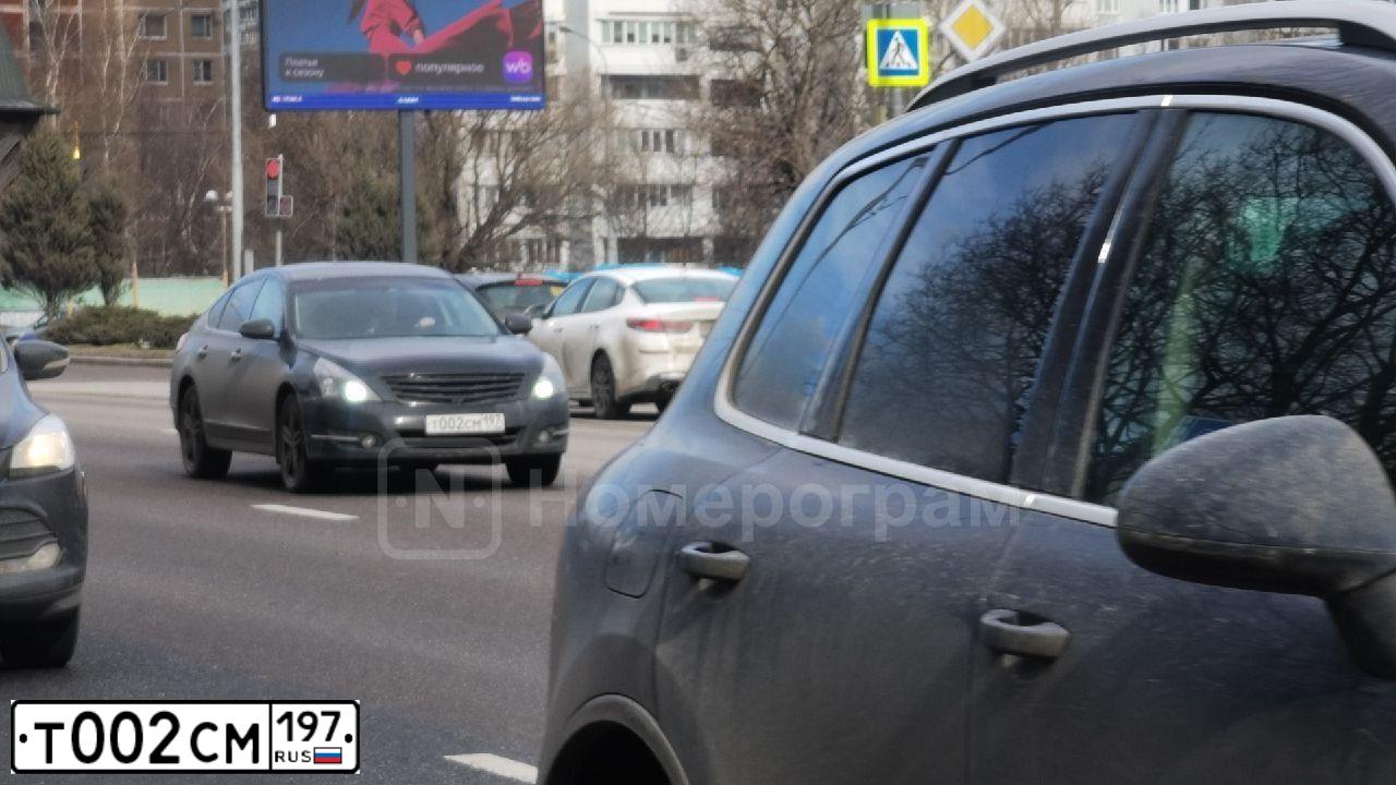 Фото автомобиля MITSUBISHI LANCER, 2008 — госномер Н437НО199. Цвет: ЧЕРНЫЙ
