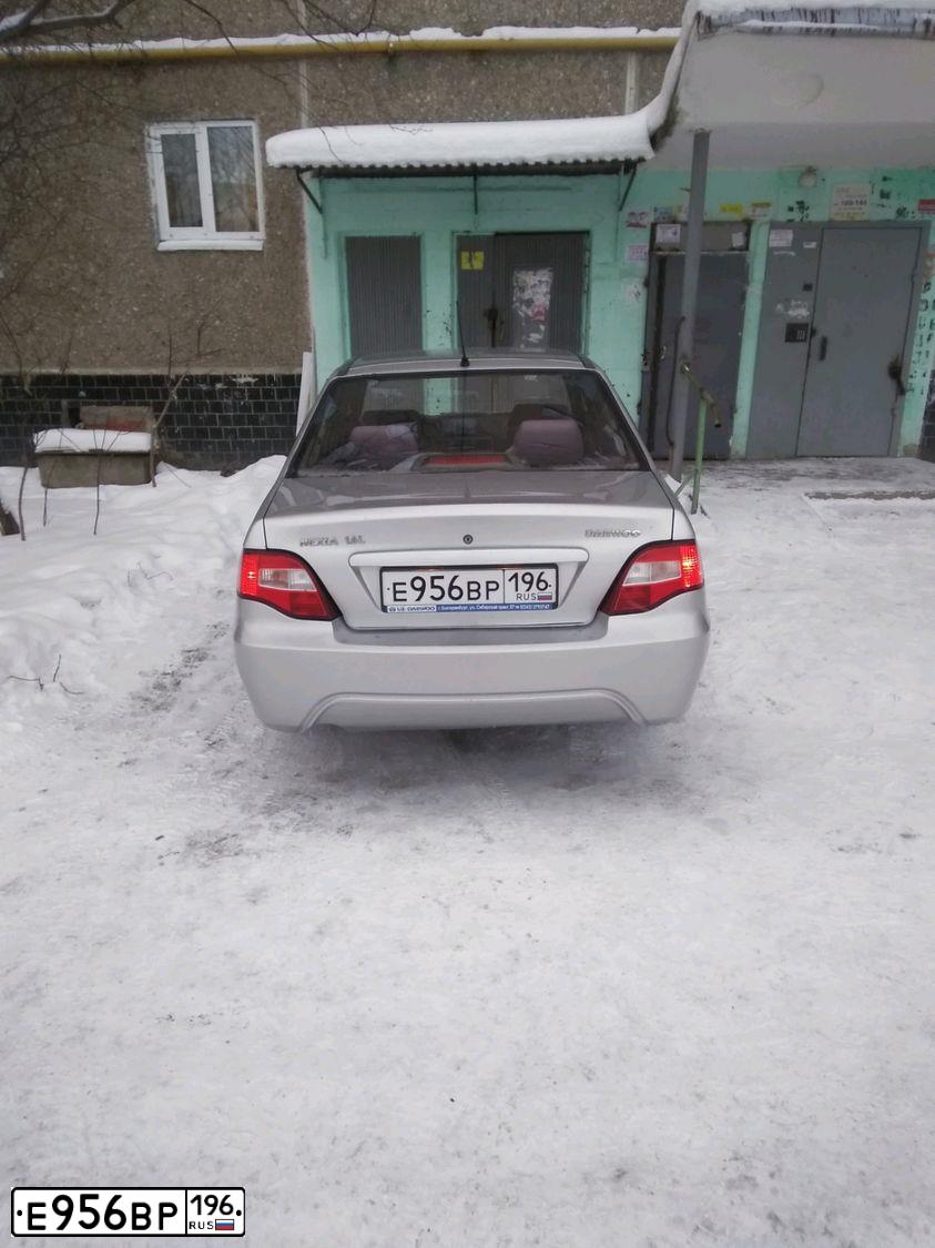 Фото автомобиля DAEWOO NEXIA, 2012 — госномер Р368ВК774. Цвет: СВЕТЛО СЕРЫЙ