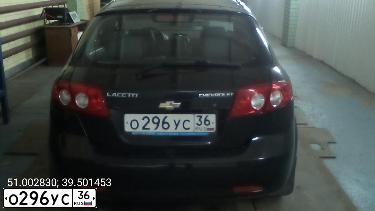 Фото автомобиля CHEVROLET LACETTI, 2012 — госномер О296УС36. Цвет: ЧЕРНЫЙ