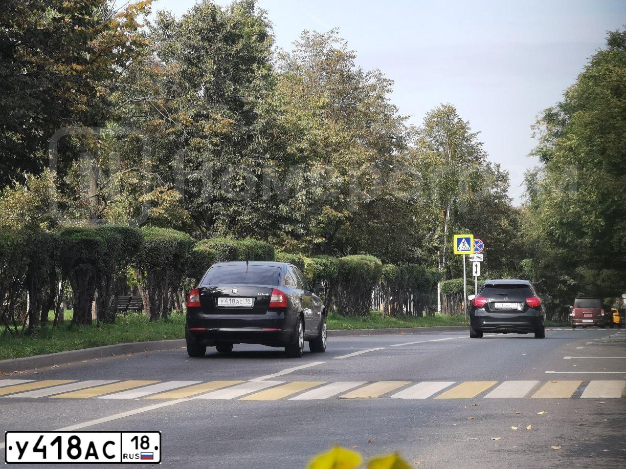 Фото автомобиля SKODA OCTAVIA, 2011 — госномер У418АС18. Цвет: ЧЕРНЫЙ