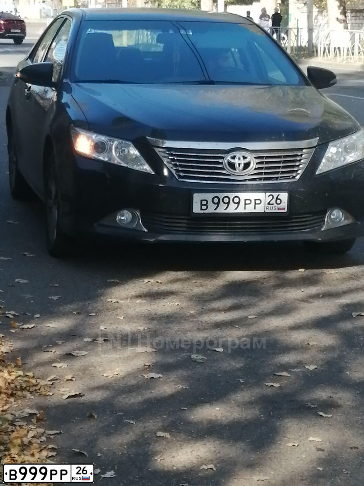 Фото автомобиля TOYOTA CAMRY, 2012 — госномер В999РВ26. Цвет: ЧЕРНЫЙ МЕТАЛЛИК
