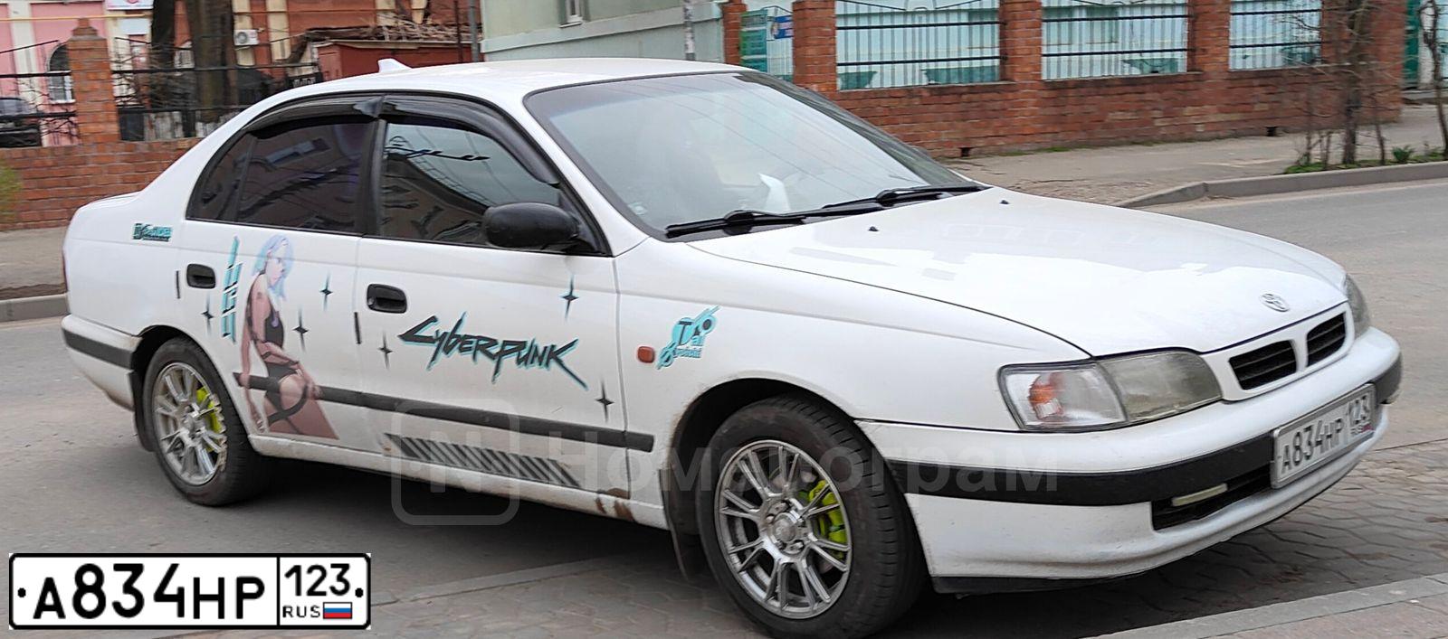 Фото автомобиля TOYOTA CARINA, 1997 — госномер А834НР123. Цвет: Белый
