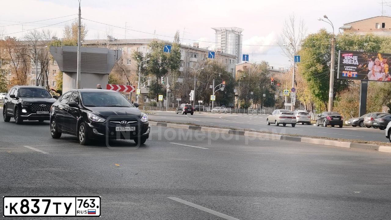 Фото автомобиля HYUNDAI SOLARIS, 2012 — госномер К837ТУ763. Цвет: ЧЕРНЫЙ