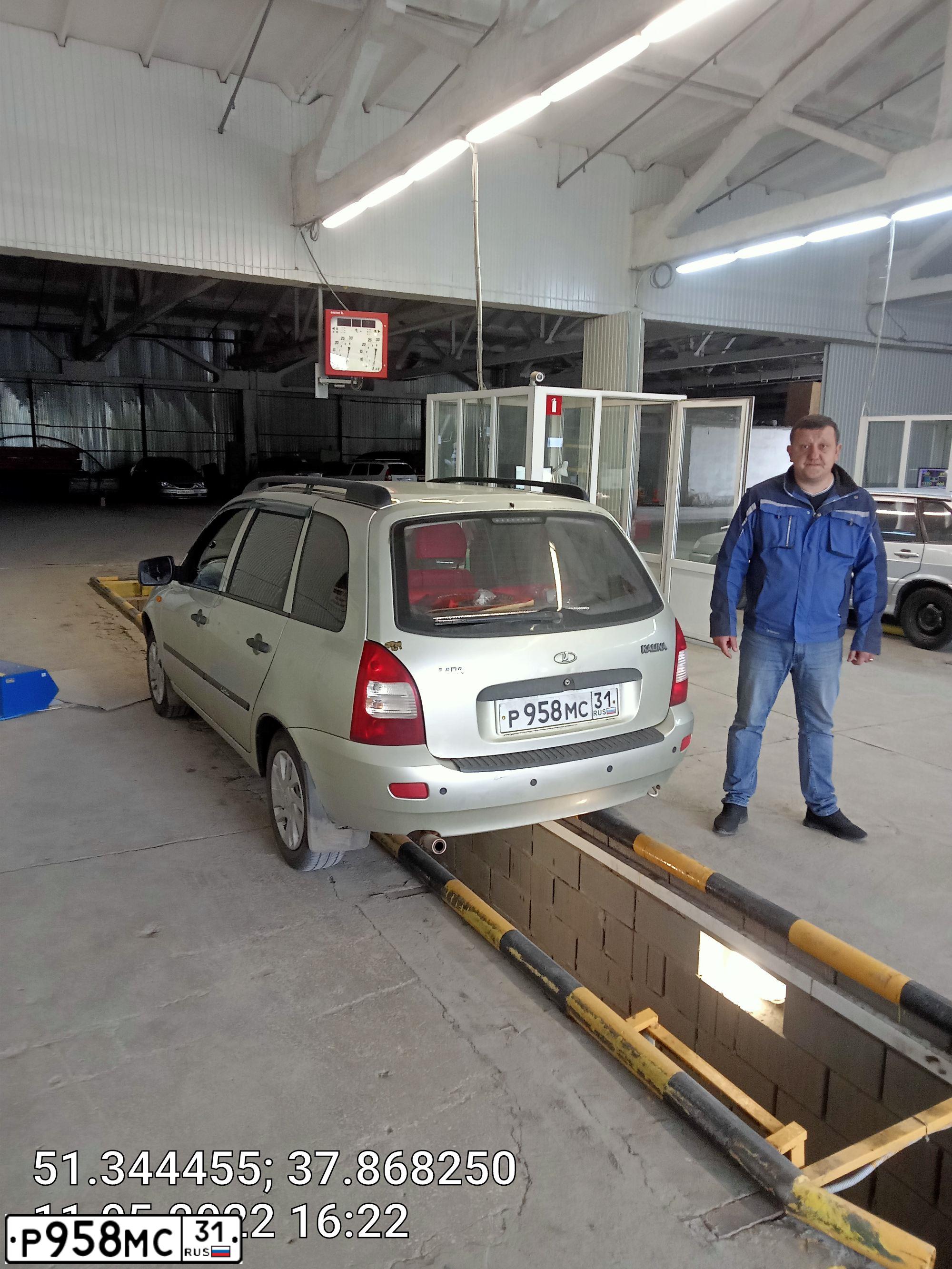 Фото автомобиля LADA 1117 KALINA, 2011 — госномер Р958МС31. Цвет: БЕЛО-ЖЕЛТЫЙ ПЕРЛАМУТРОВЫЙ