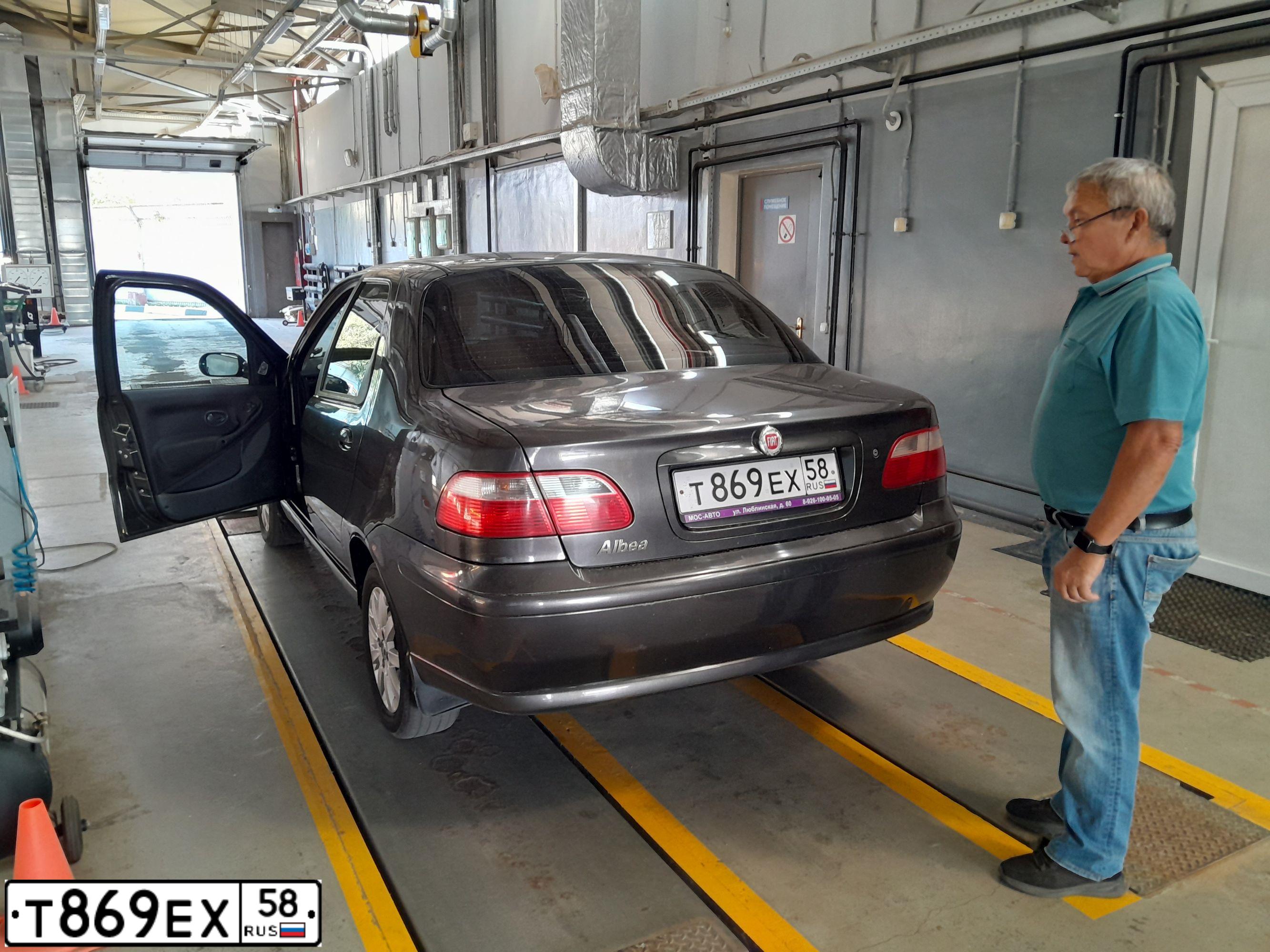 Фото автомобиля FIAT ALBEA, 2007 — госномер Т869ЕХ58. Цвет: серый андерграунд