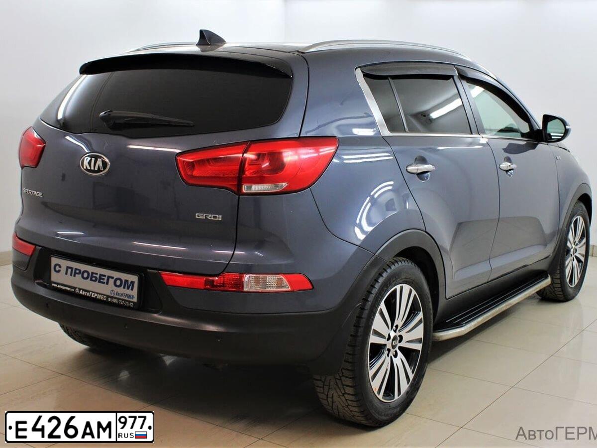 Фото автомобиля KIA SPORTAGE, 2016 — госномер О186ХЕ32. Цвет: синий