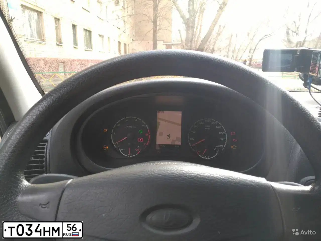 Фото автомобиля LADA 1117 KALINA, 2012 — госномер Т034НМ56. Цвет: Белый