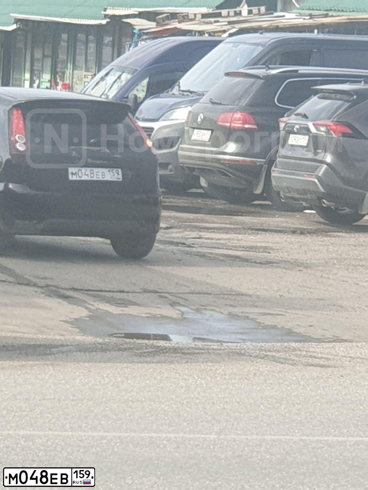Фото автомобиля FORD FIESTA / ASPIRE, 2008 — госномер М048ЕВ159. Цвет: ЧЕРНЫЙ