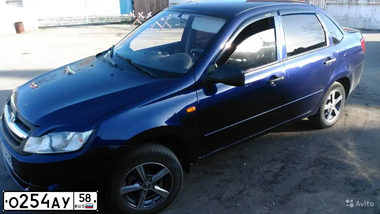 Фото автомобиля LADA 2190 GRANTA, 2012 — госномер О254АУ58. Цвет: СИНИЙ