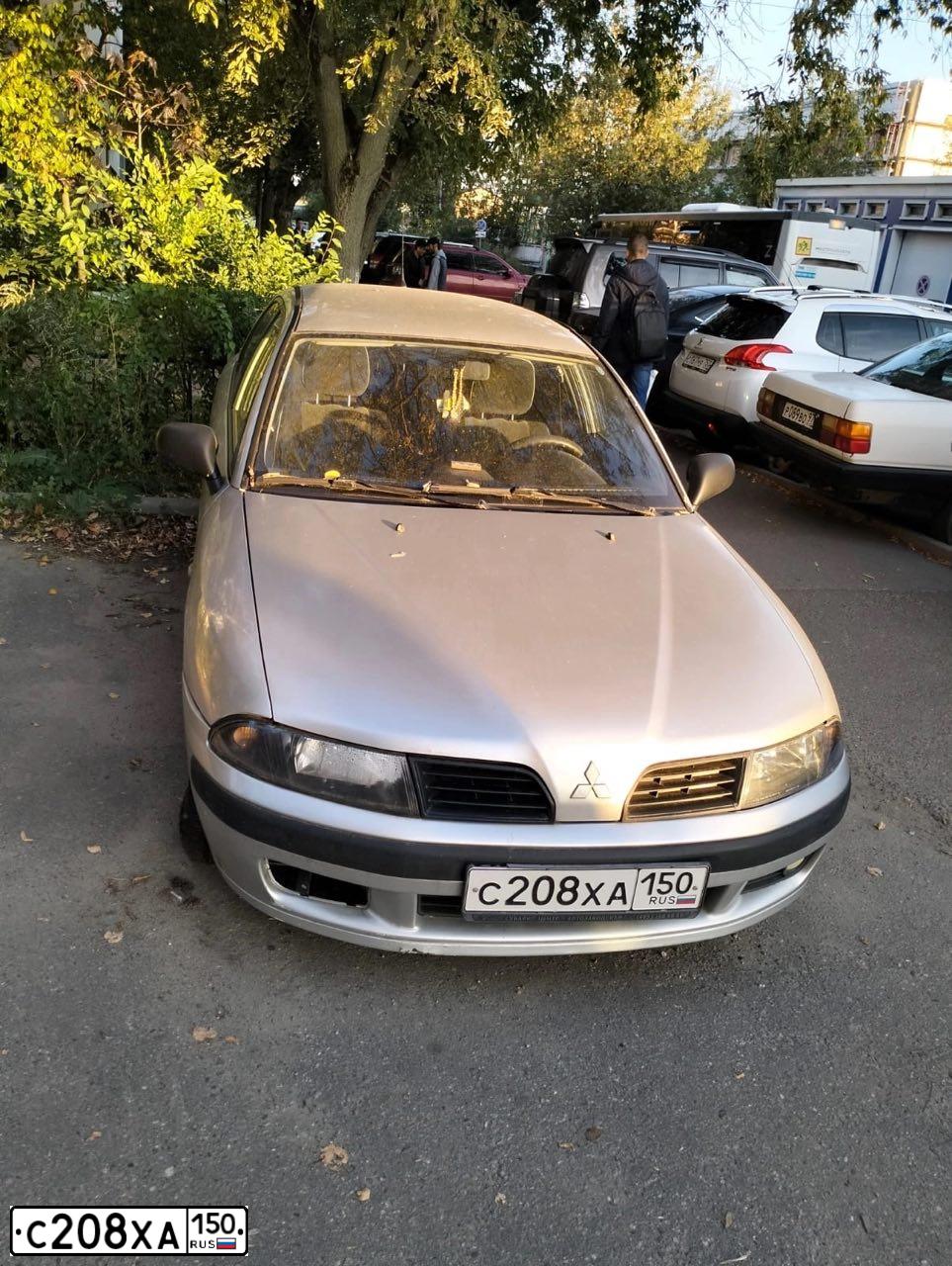 Фото автомобиля MITSUBISHI CARISMA, 2003 — госномер С208ХА150. Цвет: СЕРЫЙ СВЕТЛЫЙ