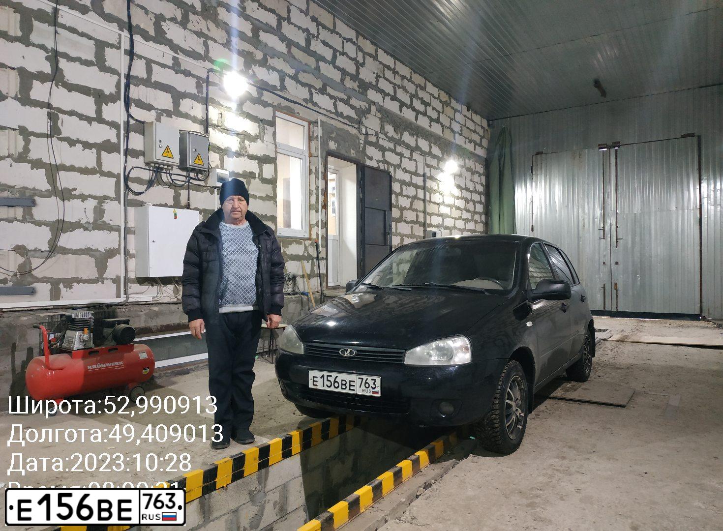 Фото автомобиля LADA 1119 KALINA, 2010 — госномер Е156ВЕ763. Цвет: Сине-Черный