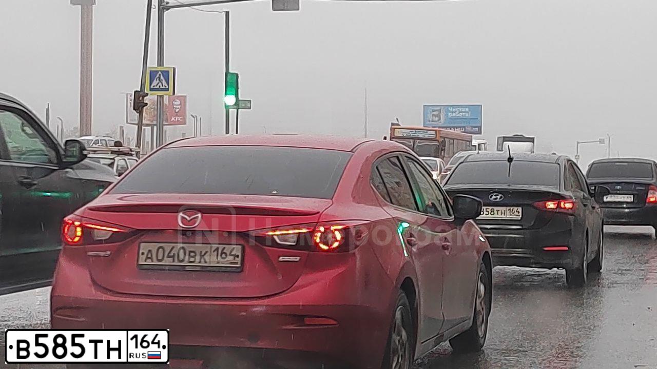 Фото автомобиля LADA 1117 KALINA, 2012 — госномер В585ТН164. Цвет: СЕРЕБРИСТО КРАСНЫЙ