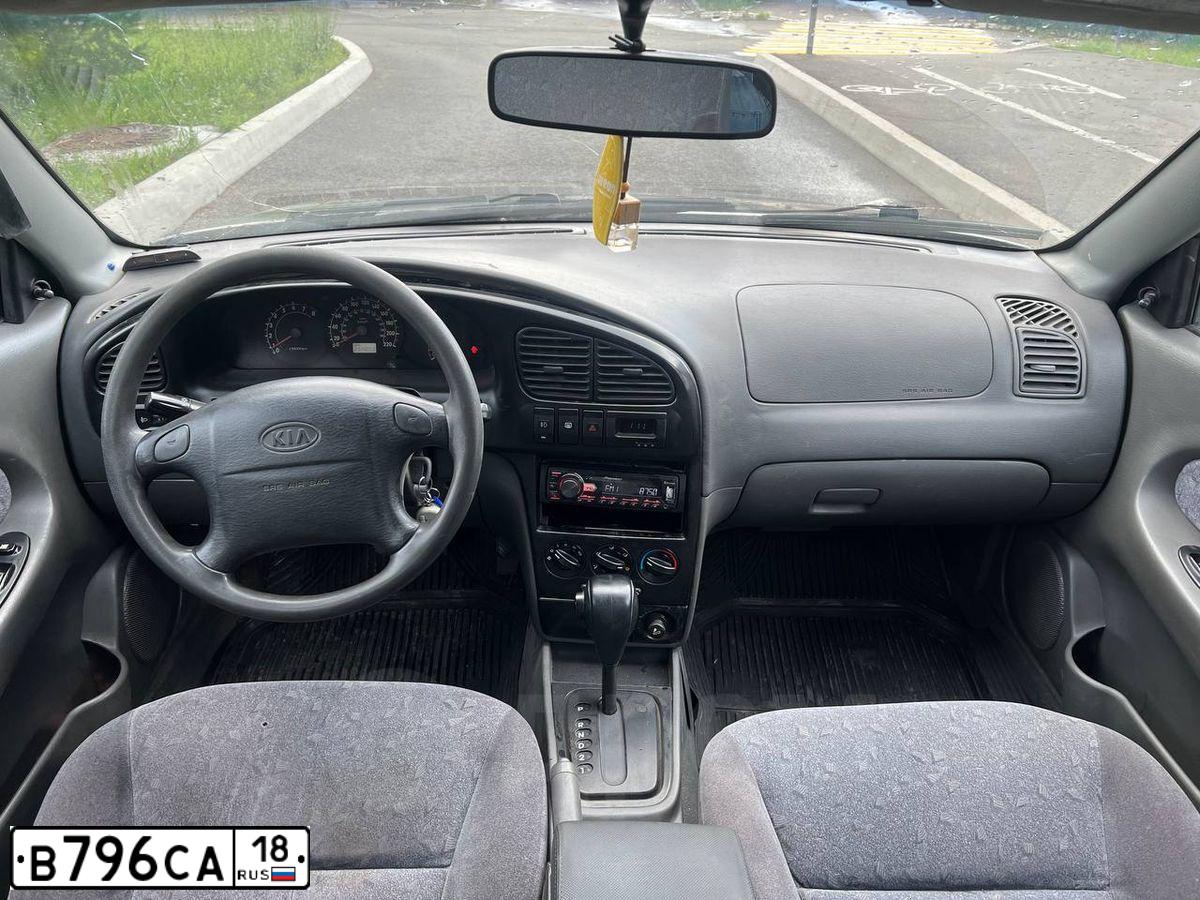 Фото автомобиля KIA SPECTRA, 2006 — госномер В796СА18. Цвет: ЧЕРНЫЙ