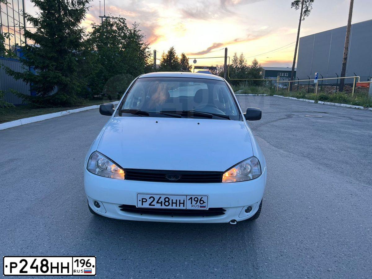 Фото автомобиля LADA 1117 KALINA, 2011 — госномер Н306РЕ72. Цвет: Белый