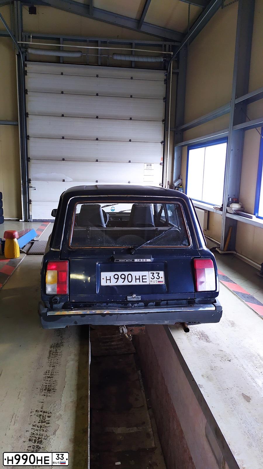 Фото автомобиля LADA 2104, 1991 — госномер Н990НЕ33. Цвет: ТЕМНО-СИНИЙ