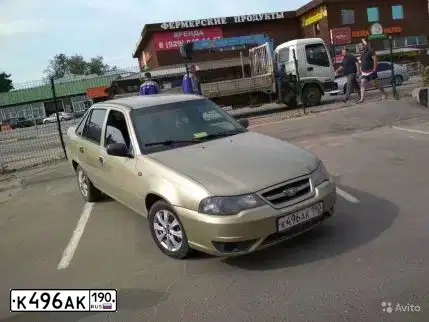 Фото автомобиля DAEWOO NEXIA, 2009 — госномер У403ВМ152. Цвет: ПЕСОЧНЫЙ