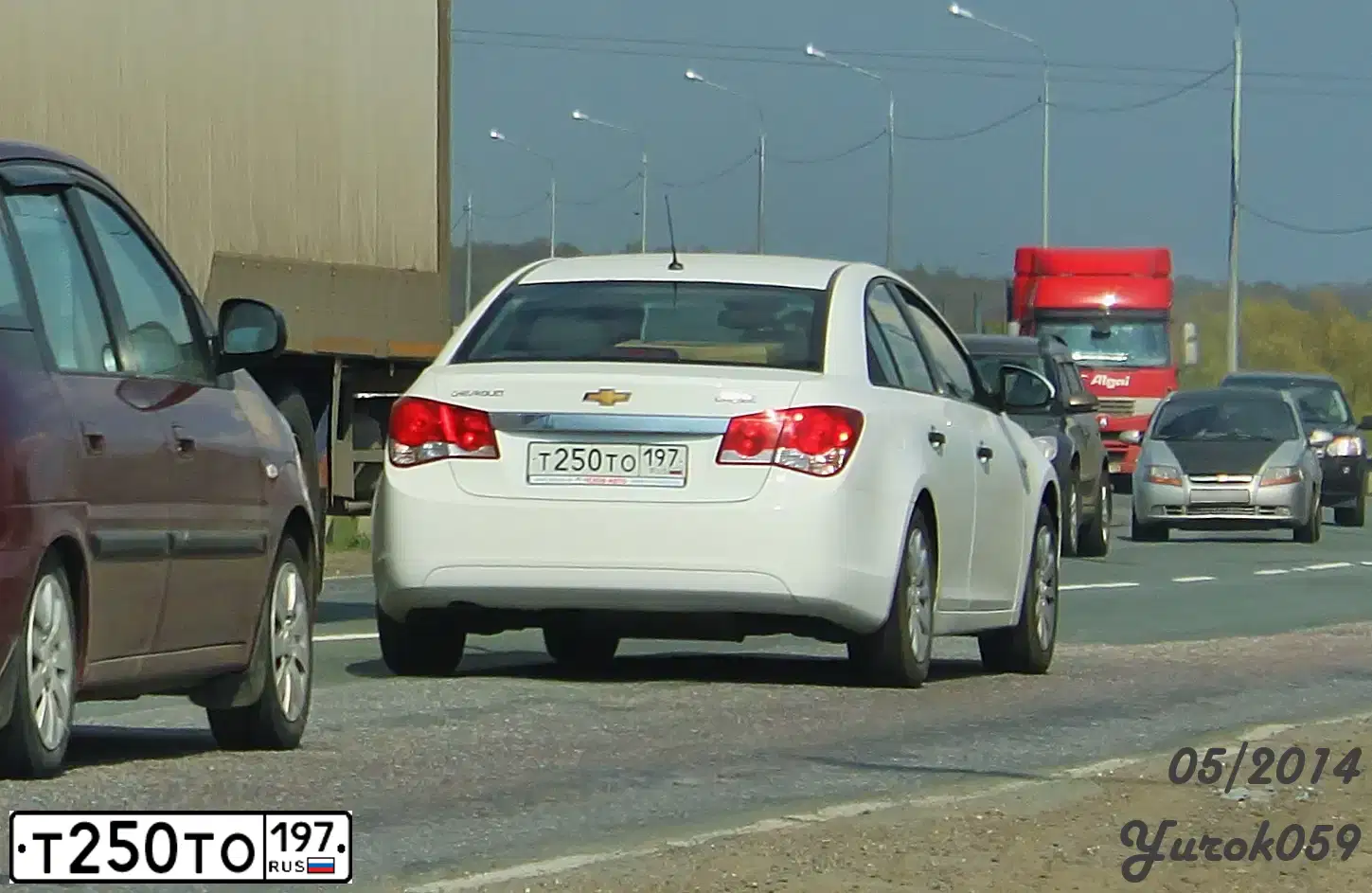 Фото автомобиля CHEVROLET CRUZE, 2011 — госномер Т250ТО197. Цвет: Белый