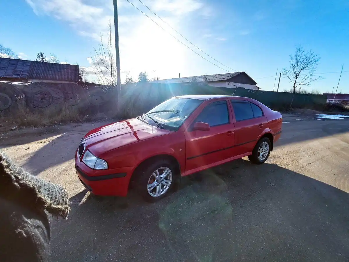 Фото автомобиля SKODA OCTAVIA, 2008 — госномер К863МК53. Цвет: Красный