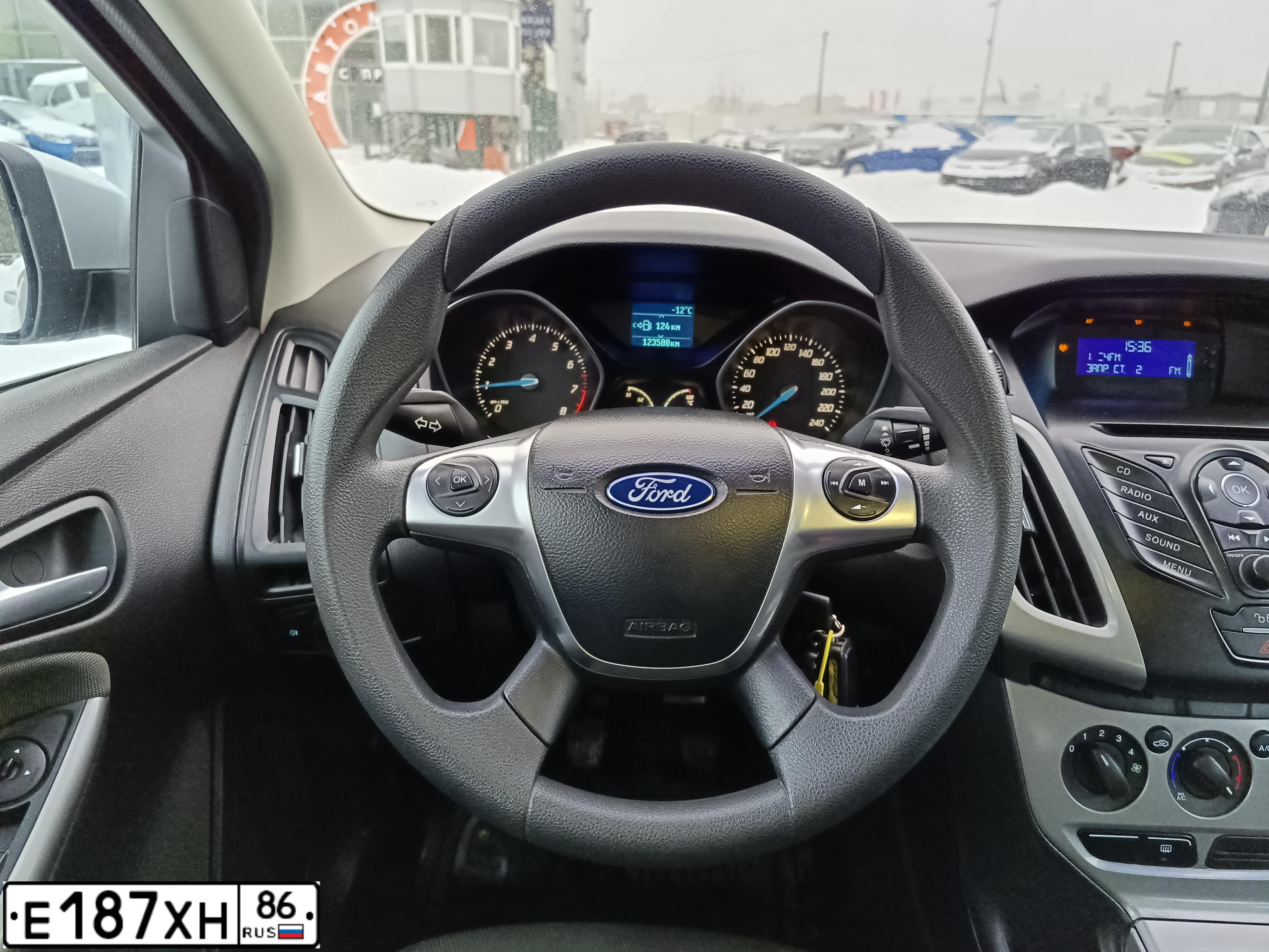 Фото автомобиля FORD FOCUS, 2011 — госномер Е187ХН86. Цвет: СЕРЕБРИСТЫЙ
