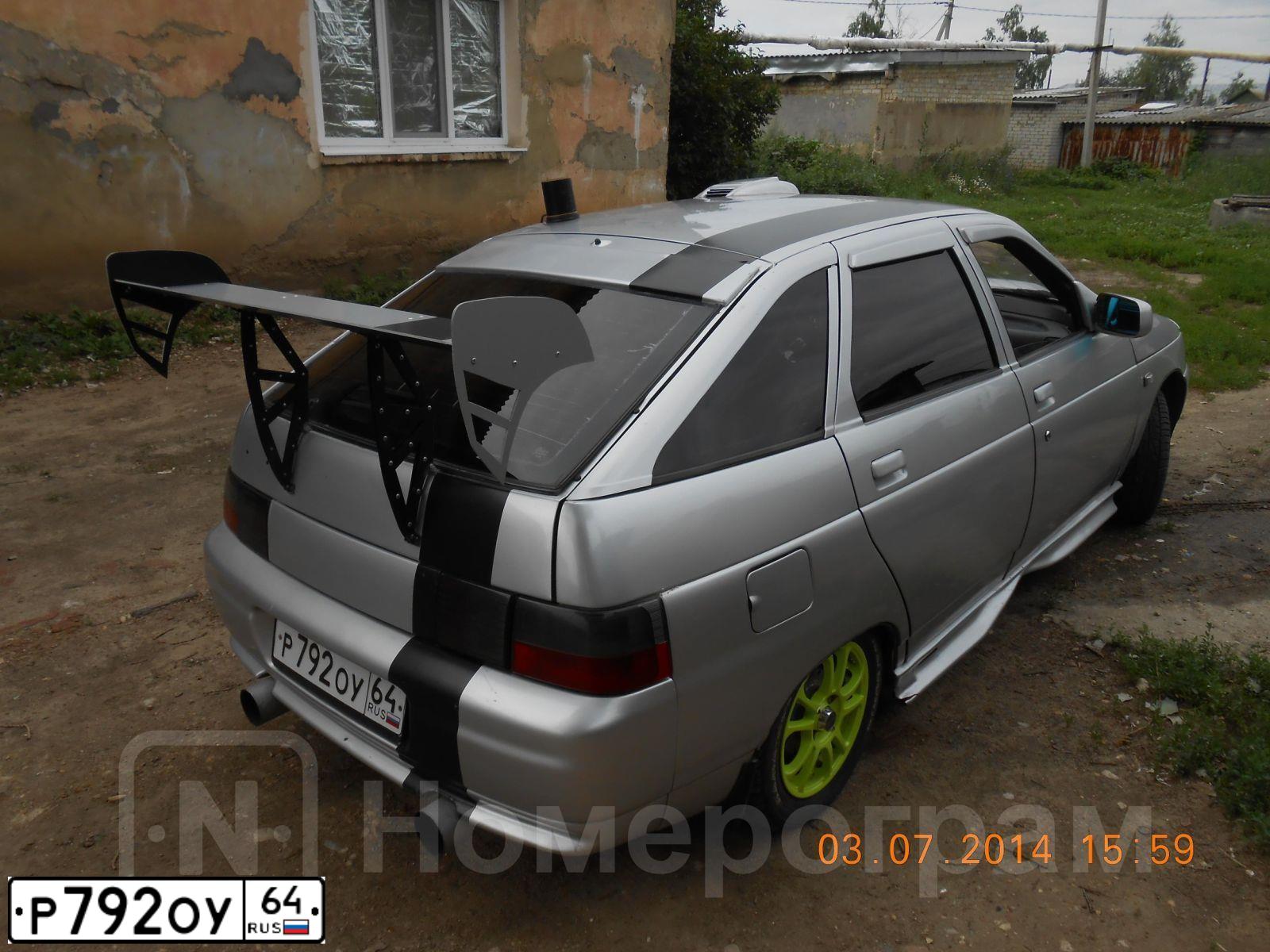 Фото автомобиля LADA 2112, 2002 — госномер К423ТУ164. Цвет: Светло-серебристый металик