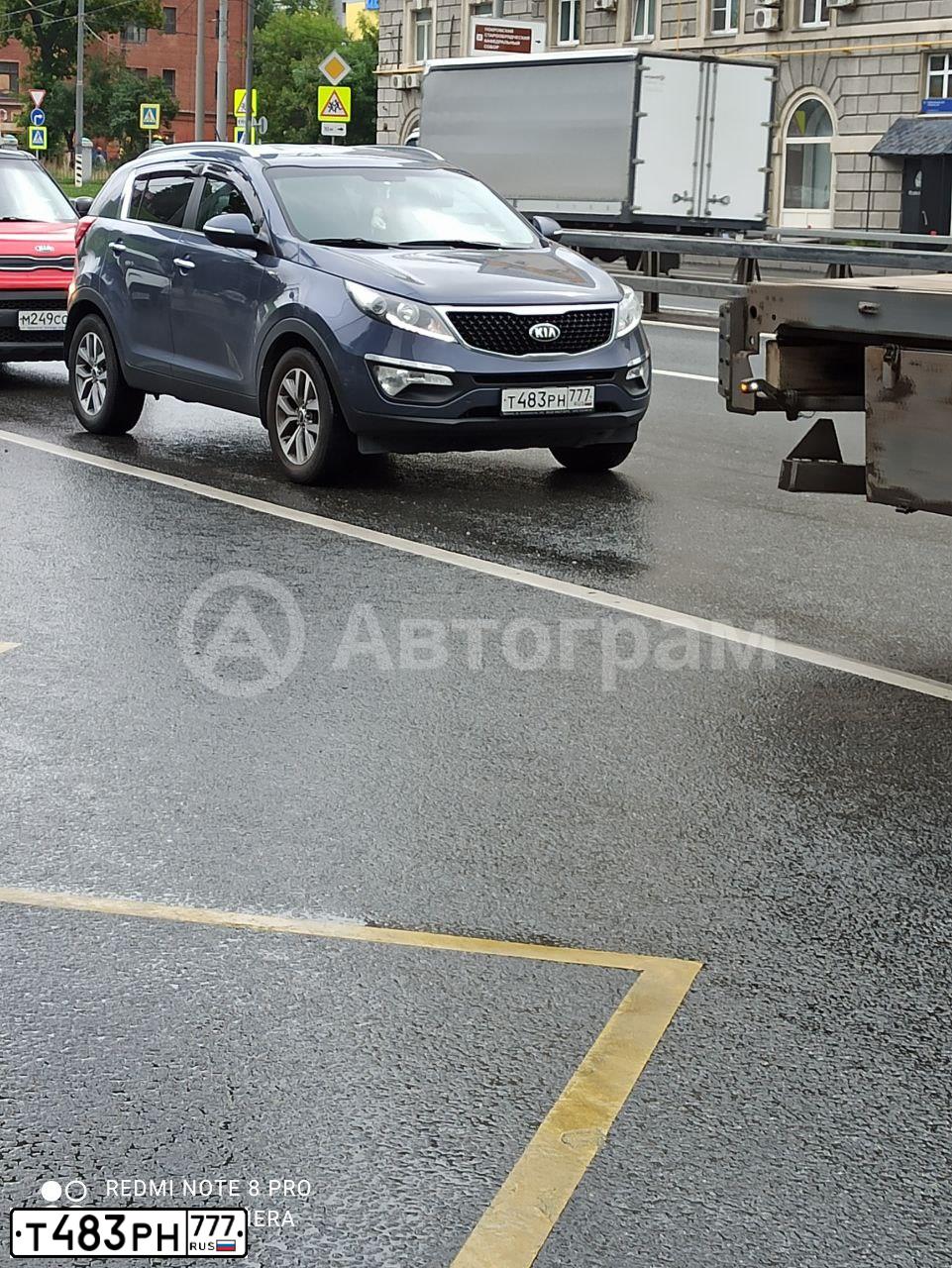 Фото автомобиля KIA SPORTAGE, 2015 — госномер Т483РН777. Цвет: СИНИЙ
