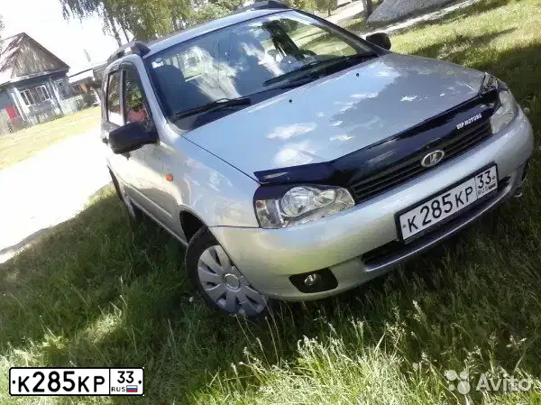 Фото автомобиля LADA 1117 KALINA, 2009 — госномер К285КР33. Цвет: СЕРЕБРИСТЫЙ