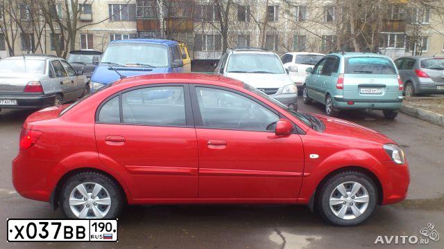 Фото автомобиля KIA RIO, 2009 — госномер Н931КО46. Цвет: КРАСНЫЙ