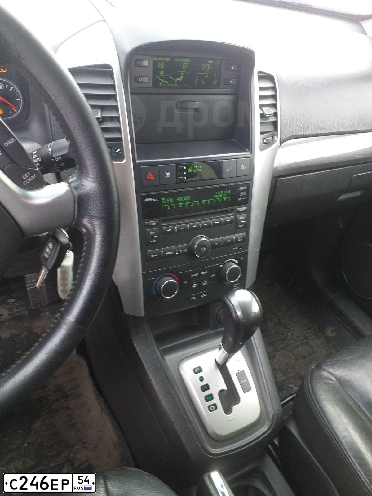 Фото автомобиля CHEVROLET CAPTIVA, 2008 — госномер А124МО122. Цвет: ТЕМНО-СЕРЫЙ