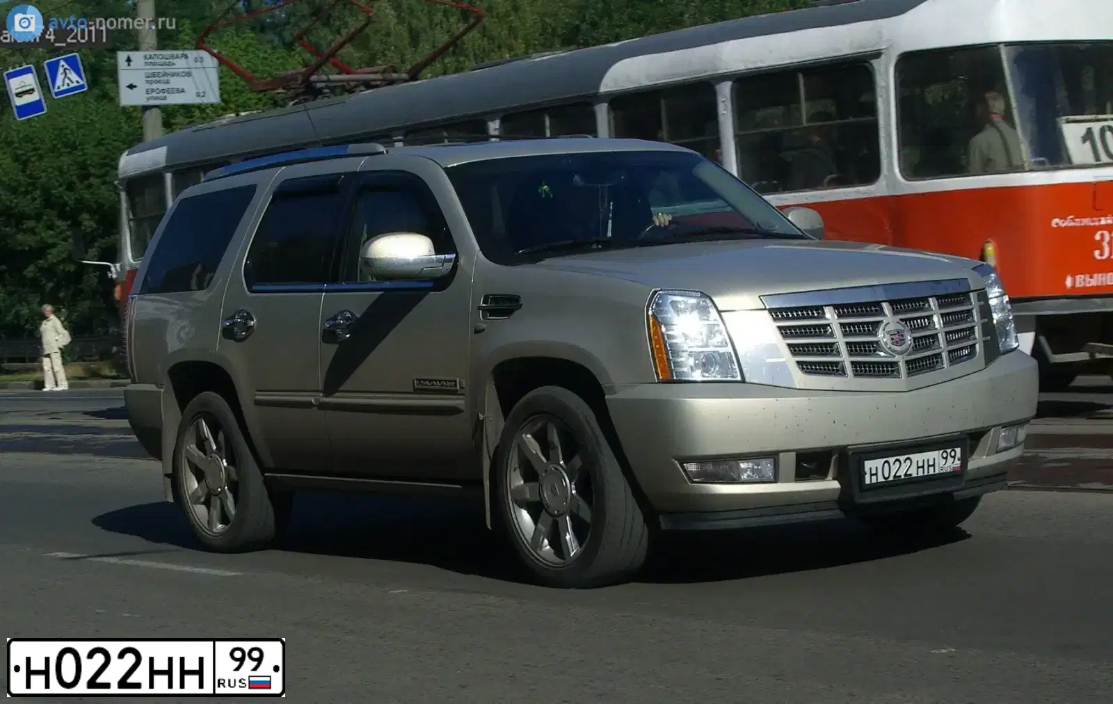 Фото автомобиля ГАЗ 3102, 2000 — госномер Н022НН99. Цвет: ЧЕРНЫЙ