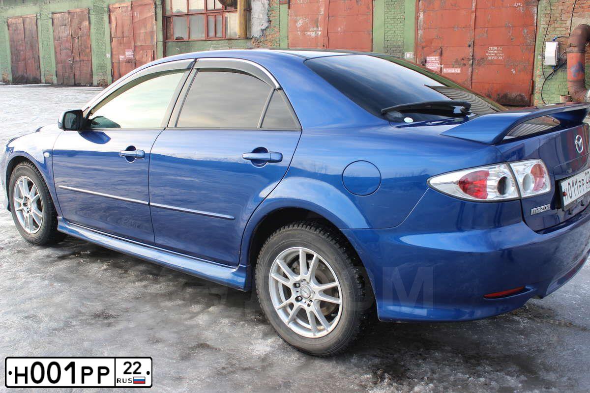 Фото автомобиля VOLKSWAGEN TOUAREG, 2008 — госномер Н001РР22. Цвет: СЕРЫЙ
