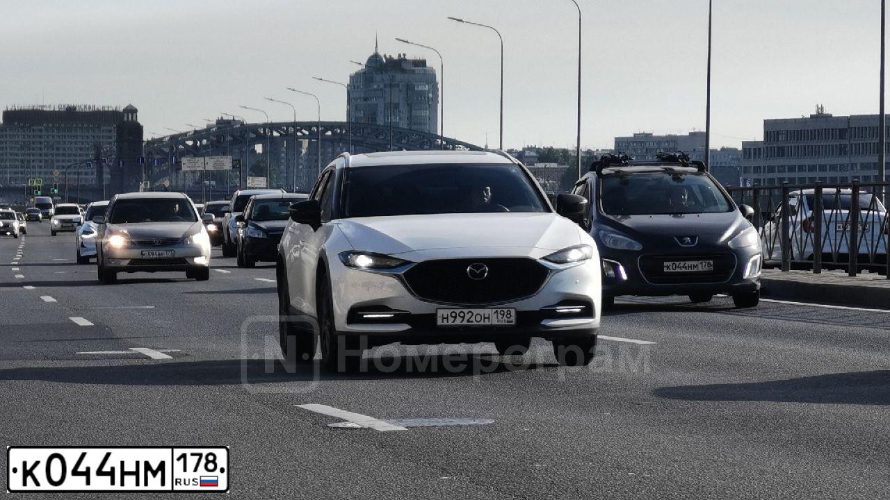Фото автомобиля PEUGEOT 308, 2011 — госномер К850МО53. Цвет: Темно-синий